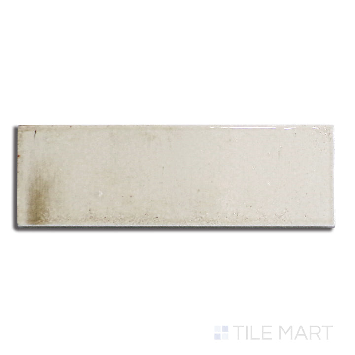 Top-down view of Gleeze Beige 2X6 Glossy Porcelain, showcasing a warm beige hue with a high-gloss finish for a refined, modern aesthetic.