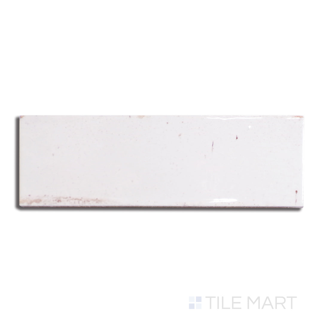 Overhead shot of Gleeze Bianco 2X6 Glossy Porcelain, featuring a crisp white surface with a reflective sheen for a sleek, contemporary look.