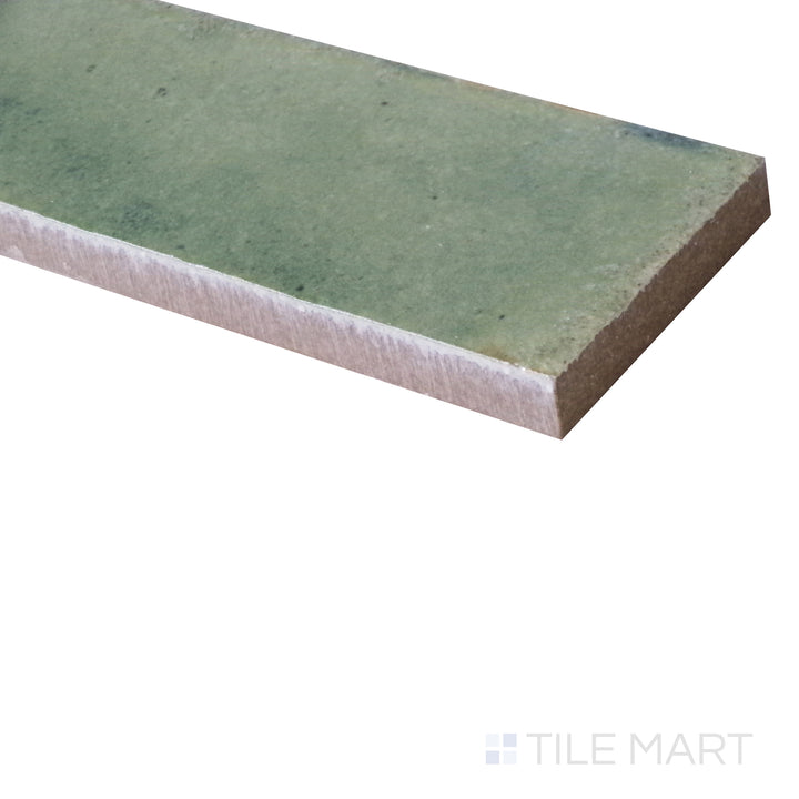 An angled perspective enhances the depth of this Giada green glossy porcelain tile, revealing its rich color and glass-like sheen.