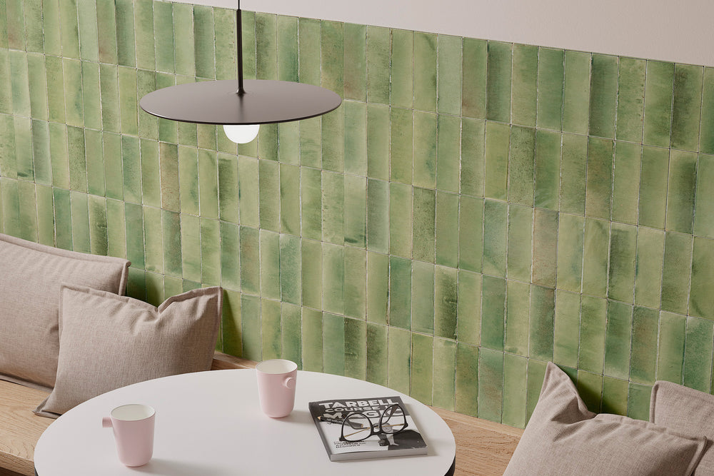 A vibrant and contemporary ambiance featuring Gleeze Giada glossy porcelain, blending modern style with bold color.