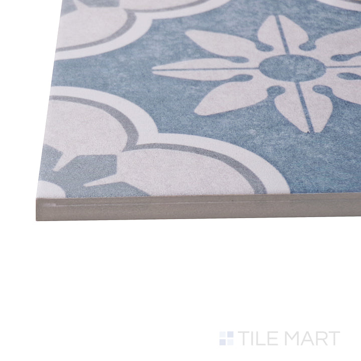 Captured from a corner angle, the Hampton 15 Montauk 6x6 matte porcelain tile showcases its soft, neutral color and smooth matte surface, creating a timeless and elegant look.