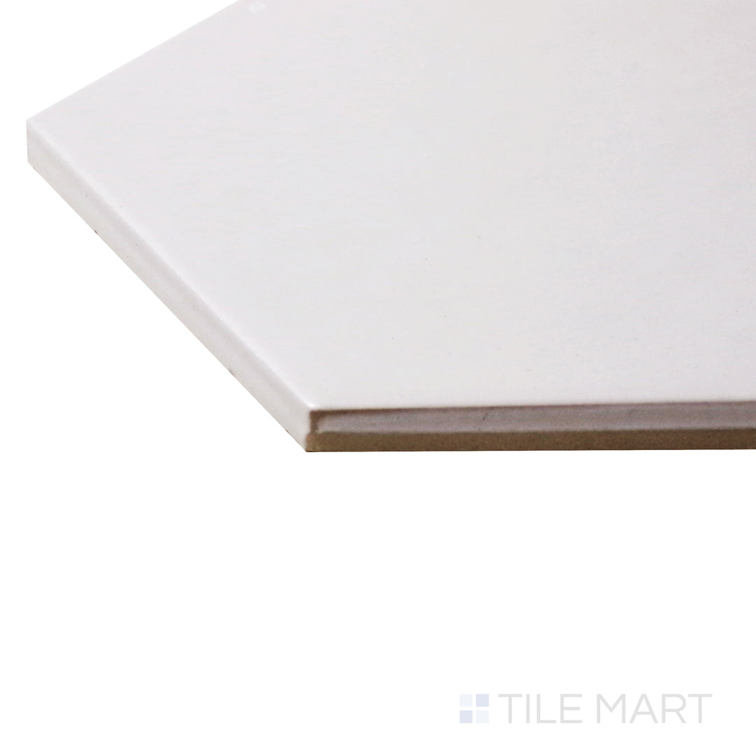 Captured from a corner angle, the Hexatile Blanco 8" hexagon matte porcelain tile showcases its crisp white shade and geometric hexagonal shape, perfect for modern and minimalist spaces.