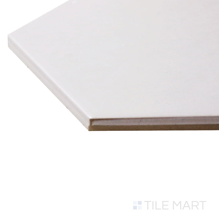 Captured from a corner angle, the Hexatile Blanco 8" hexagon matte porcelain tile showcases its crisp white shade and geometric hexagonal shape, perfect for modern and minimalist spaces.