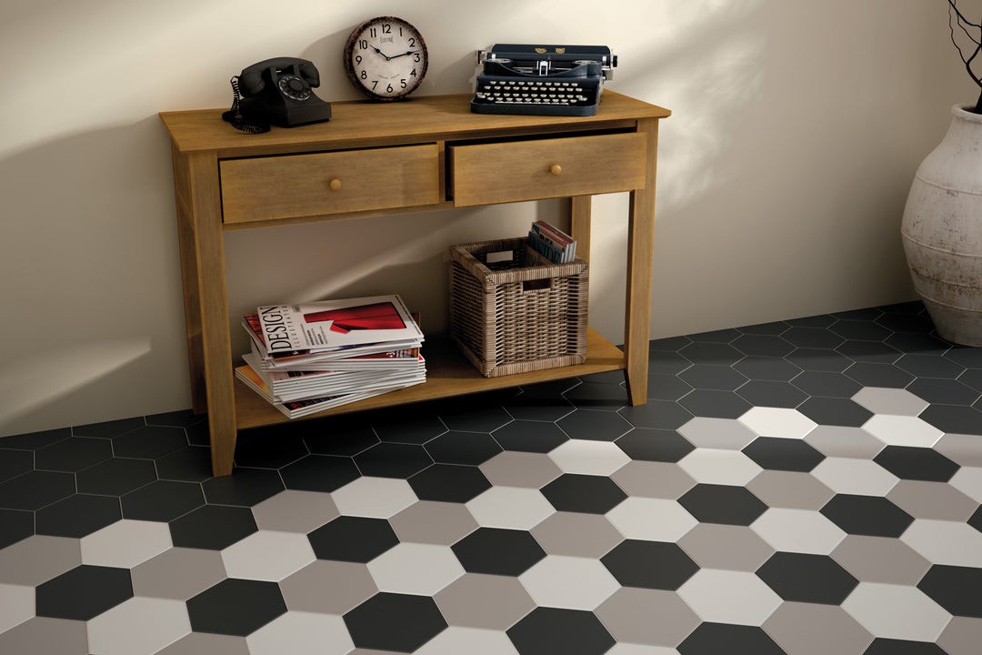 A sophisticated and structured interior brought to life with Hexatile Blanco hexagon matte porcelain, combining geometry and minimalism.