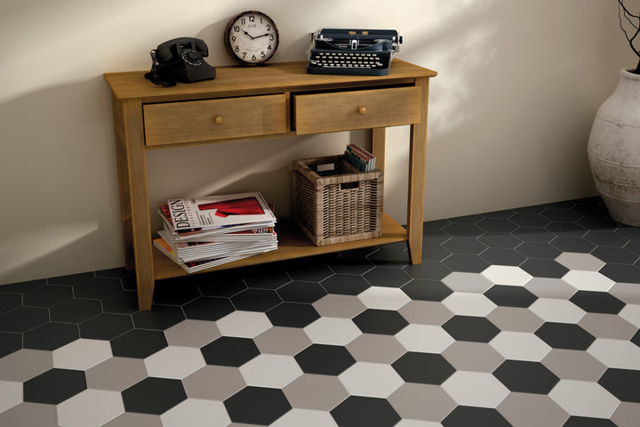 A sophisticated and structured interior brought to life with Hexatile Blanco hexagon matte porcelain, combining geometry and minimalism.