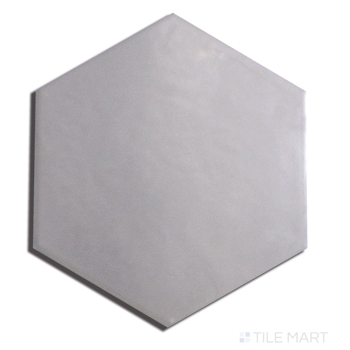 Flat lay of Hexatile Gris 8" Hexagon Matte Porcelain, featuring a soft grey hue with a structured hexagonal shape.