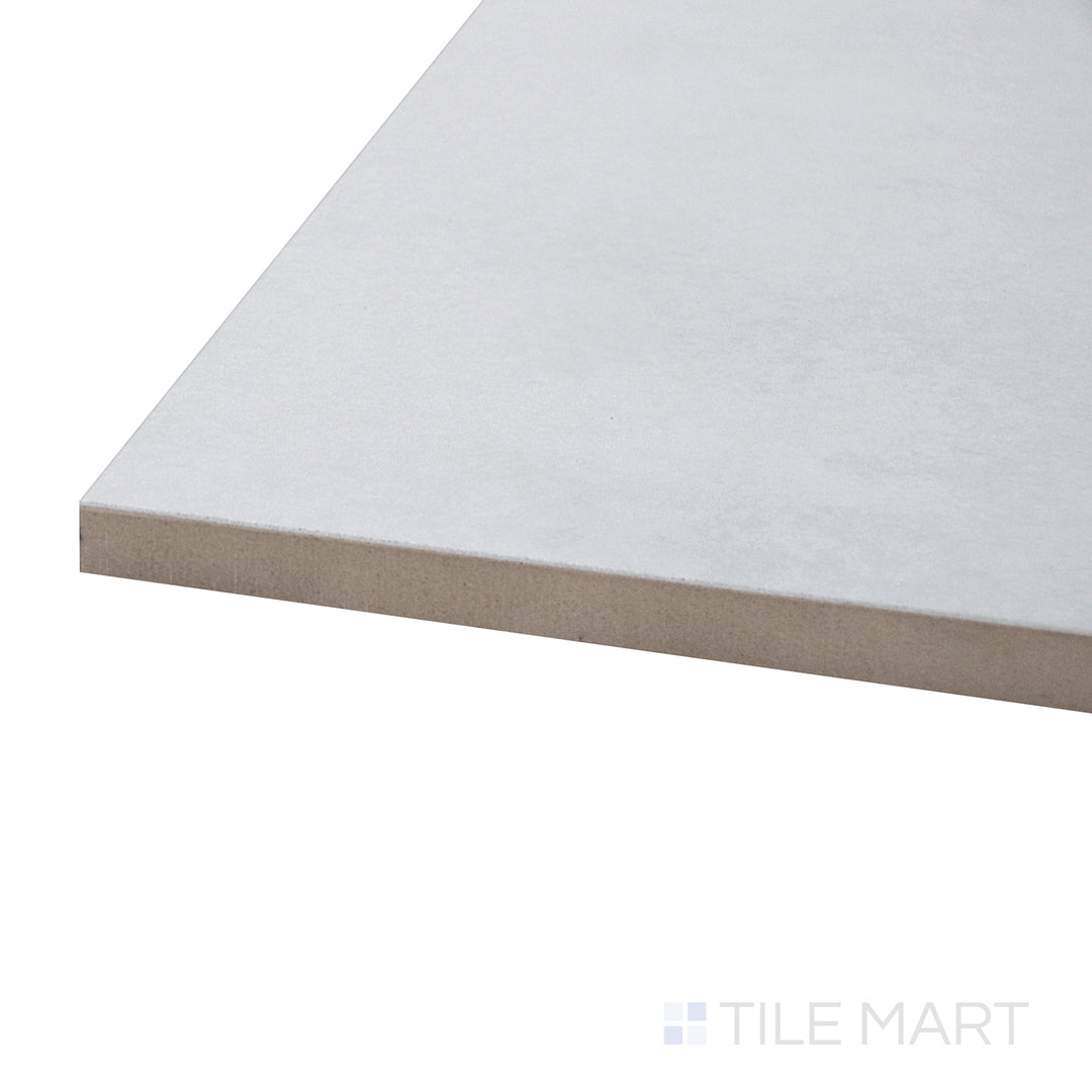 A corner perspective of the Kadence Perla 48x48 polished porcelain tile emphasizes its soft neutral tones and polished finish, making it an ideal choice for upscale interiors.