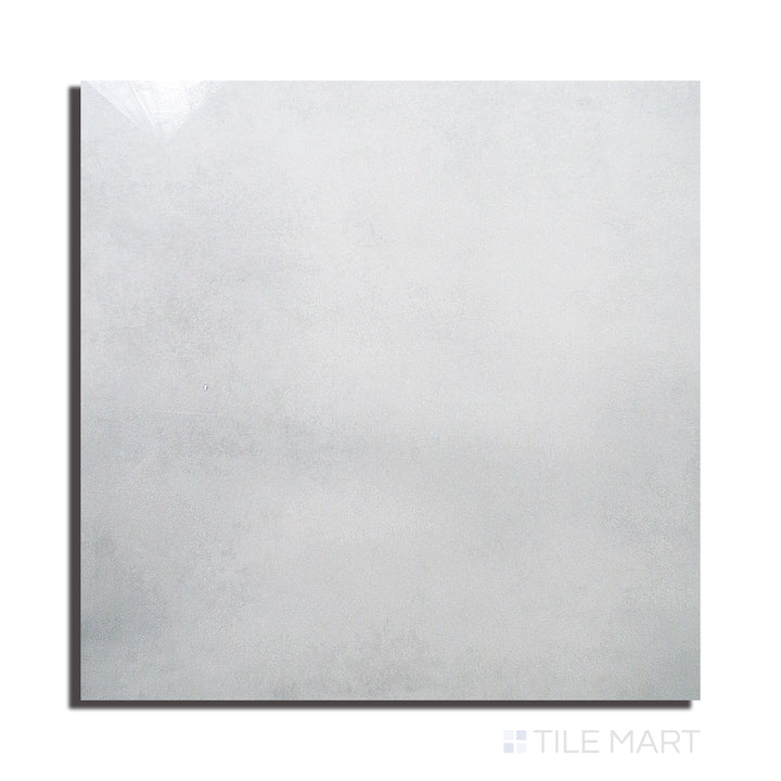 Top-down image of Kadence Perla 48X48 Polished Porcelain, emphasizing a subtle pearl grey color with a high-gloss polished surface.