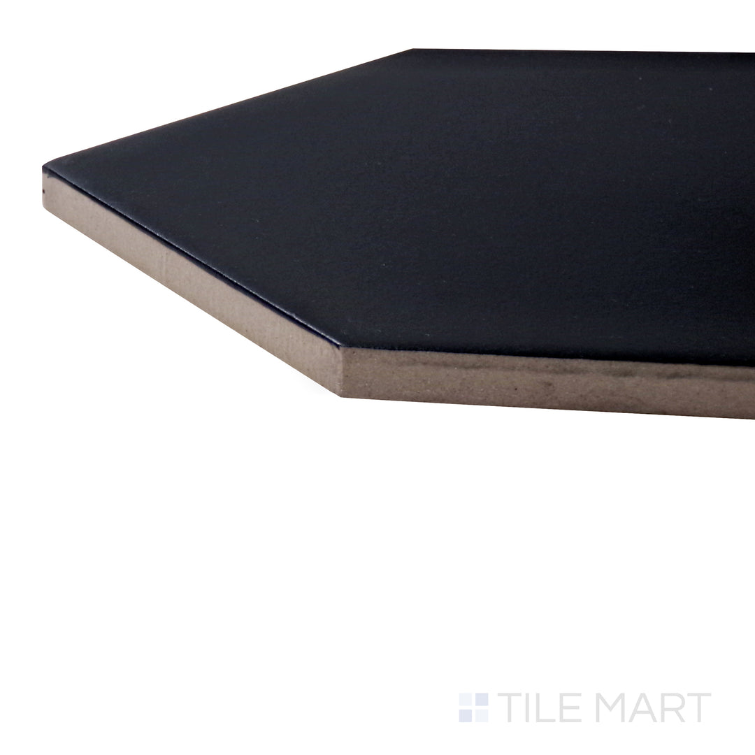 A corner shot of the Kite Black 4x12 matte porcelain tile highlights its deep black hue and smooth matte finish, creating a bold and modern aesthetic.