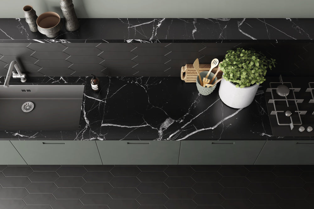A modern and dramatic ambiance featuring Kite Black matte porcelain, embracing bold, sleek aesthetics.