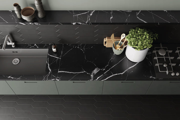 A modern and dramatic ambiance featuring Kite Black matte porcelain, embracing bold, sleek aesthetics.