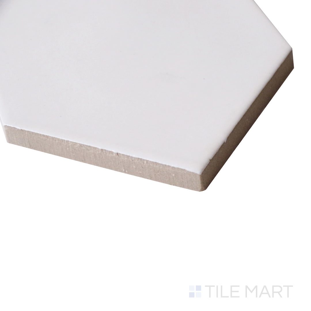 An angled view captures the crisp white tones and clean matte finish of this tile, offering a bright and sophisticated touch.