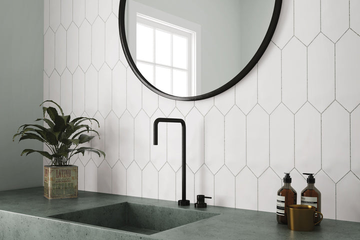 A bright and inviting roomscene showcasing Kite White 4X12 matte porcelain, offering a clean, minimalist aesthetic with a refined touch.