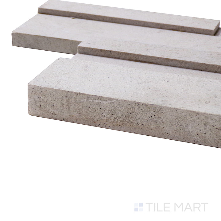 A corner shot of the Modern Ledgestone Cream 6x24 porcelain tile highlights its soft cream tones and natural texture, bringing warmth and elegance to walls and surfaces.