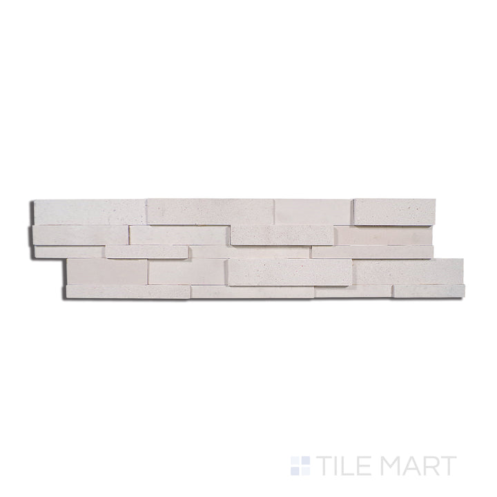 Flat lay of Modern Ledgestone Cream 6X24 Porcelain, presenting a creamy beige tone with a textured finish reminiscent of natural stone.