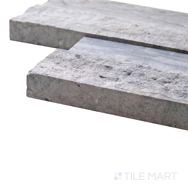 Captured from a corner angle, the Natural Splitface Stackstone Panels Blue Oak 6x24 showcases its unique blue and brown stone variations, adding a striking and earthy appeal.