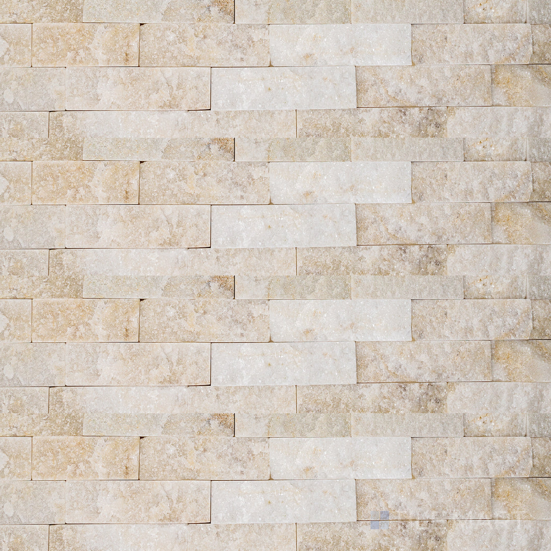 Flat-lay image of Natural Splitface Stackstone Panels Champagne 6X24, showcasing a rugged, textured stone panel in warm champagne hues.