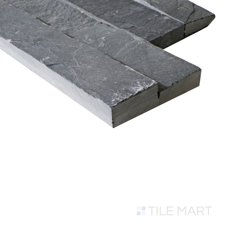 A side-angle perspective enhances the deep, moody Midnight stackstone, bringing out its dramatic texture and natural stone layering.