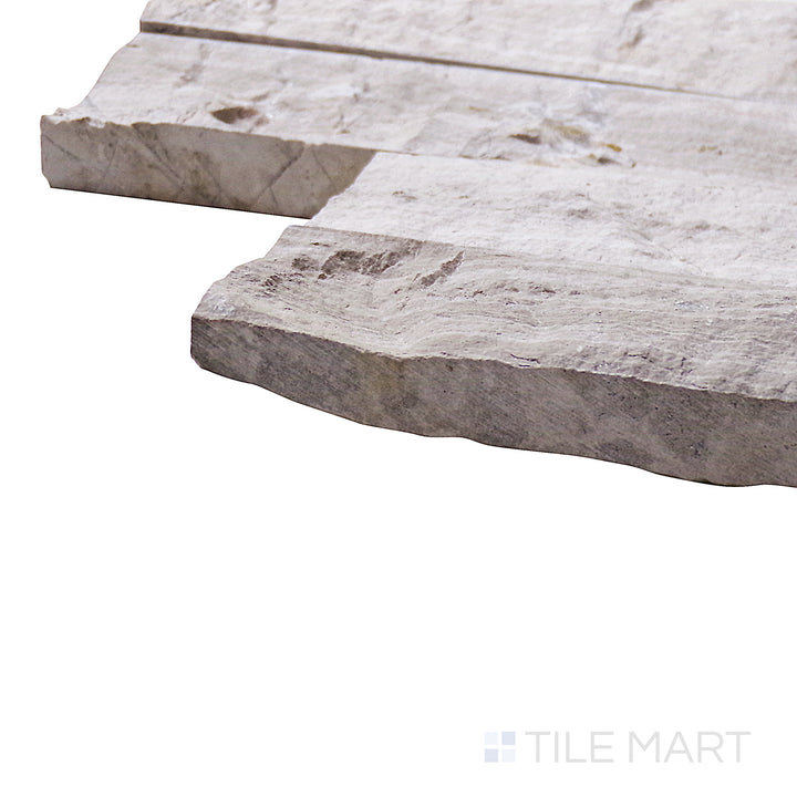 A corner perspective of the Natural Splitface Stackstone Panels Wooden Vein 6x24 emphasizes its wood-grain inspired stone texture, blending natural wood aesthetics with durable stone properties.