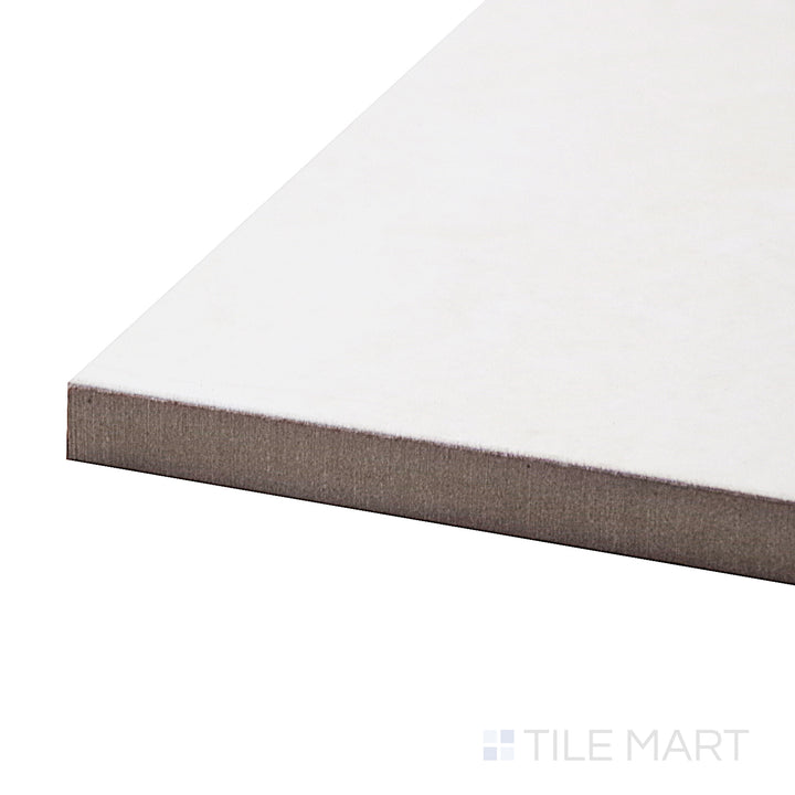 A corner shot of the Lugano Marfil 24x24 polished porcelain tile highlights its warm beige tones and reflective finish, delivering a luxurious and sophisticated look.