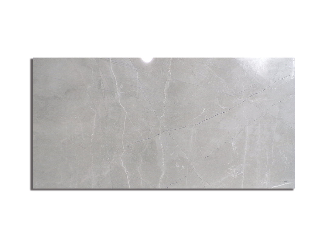 Aerial view of Luxury Amani Grey 12X24 Polished Porcelain, featuring a sophisticated grey surface with elegant veining and a polished finish.