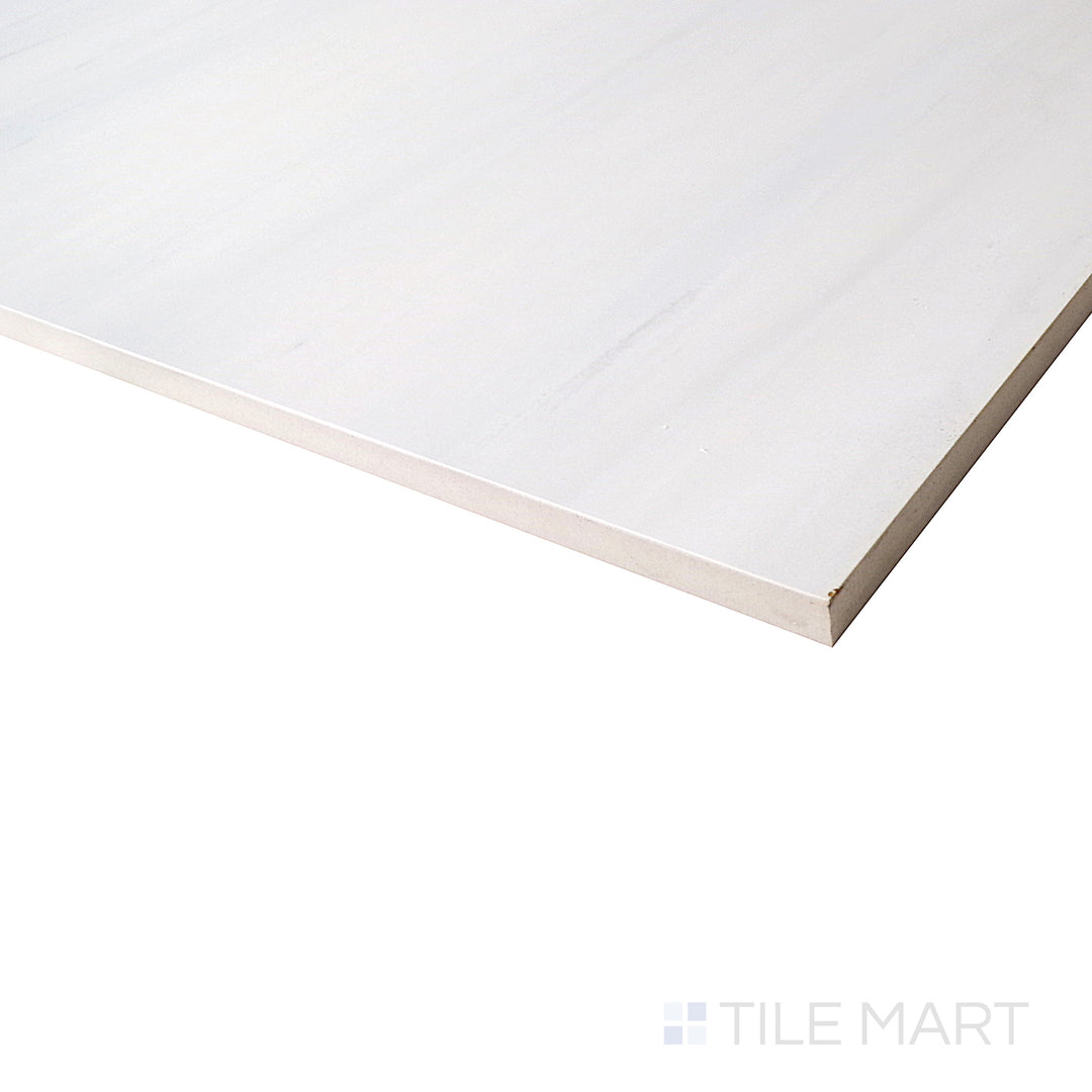 A side view captures the brilliant white surface of Deodat White porcelain, featuring delicate veining and a glossy finish for an elegant touch.