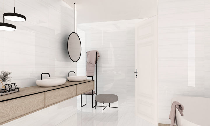 A bright and airy lifestyle scene featuring Luxury Deodat White 24X48 polished porcelain, perfect for a refined and timeless aesthetic.