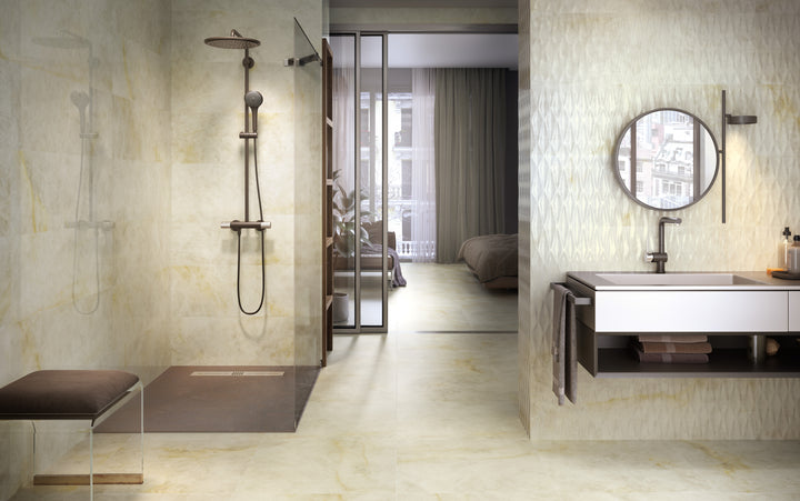 A serene environment accented by Luxury Kristalus Cream 24X48 polished porcelain, delivering warmth with a touch of opulence.