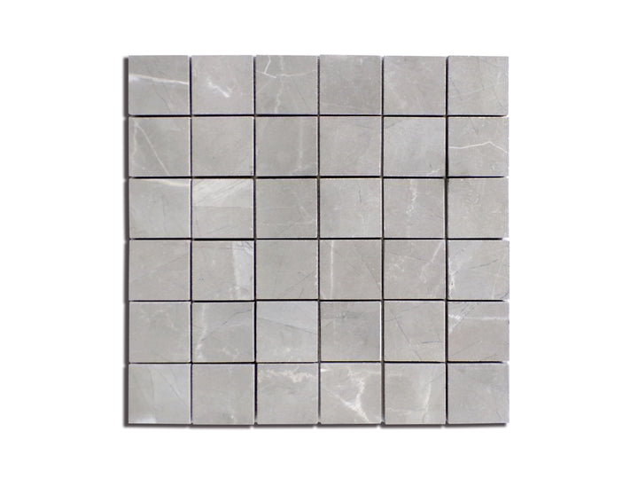 Top-down perspective of Luxury Amani Grey 2" Square Polished Porcelain Mosaic, displaying a mosaic pattern of deep grey polished porcelain with veined details.