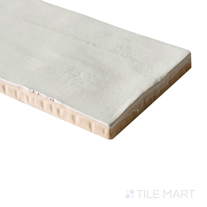 Angled view displaying the earthy green color and soft matte glaze of Mallorca Green 2X8 Matte Ceramic.