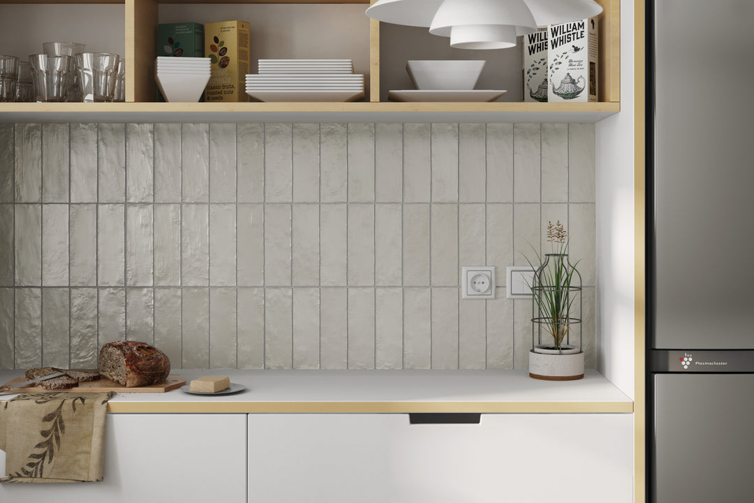 An inviting interior with Mallorca Green 2X8 matte ceramic, bringing a touch of natural elegance and tranquility.