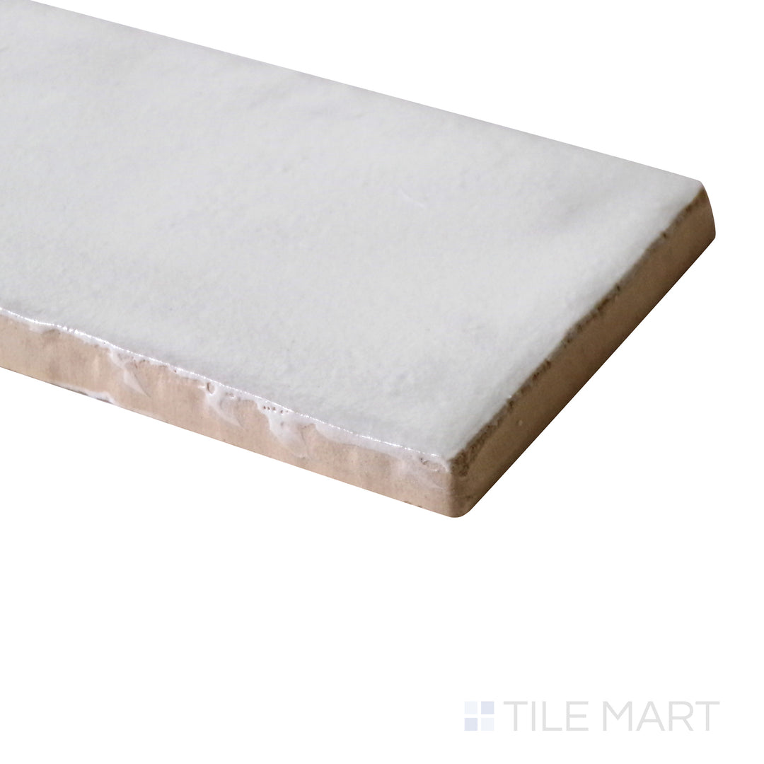 Close-up angle shot revealing the crisp white color and smooth matte texture of Mallorca White 2X8 Matte Ceramic.