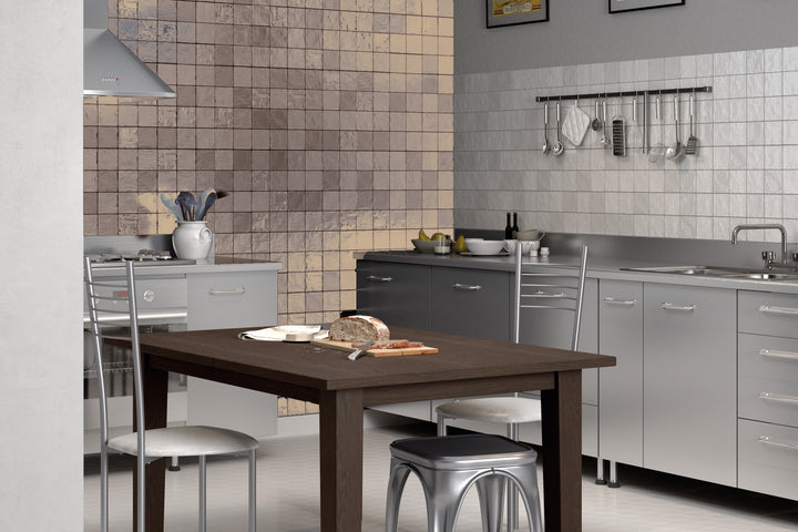 A crisp and minimalist design featuring Mallorca White 4X4 matte ceramic, delivering timeless simplicity.