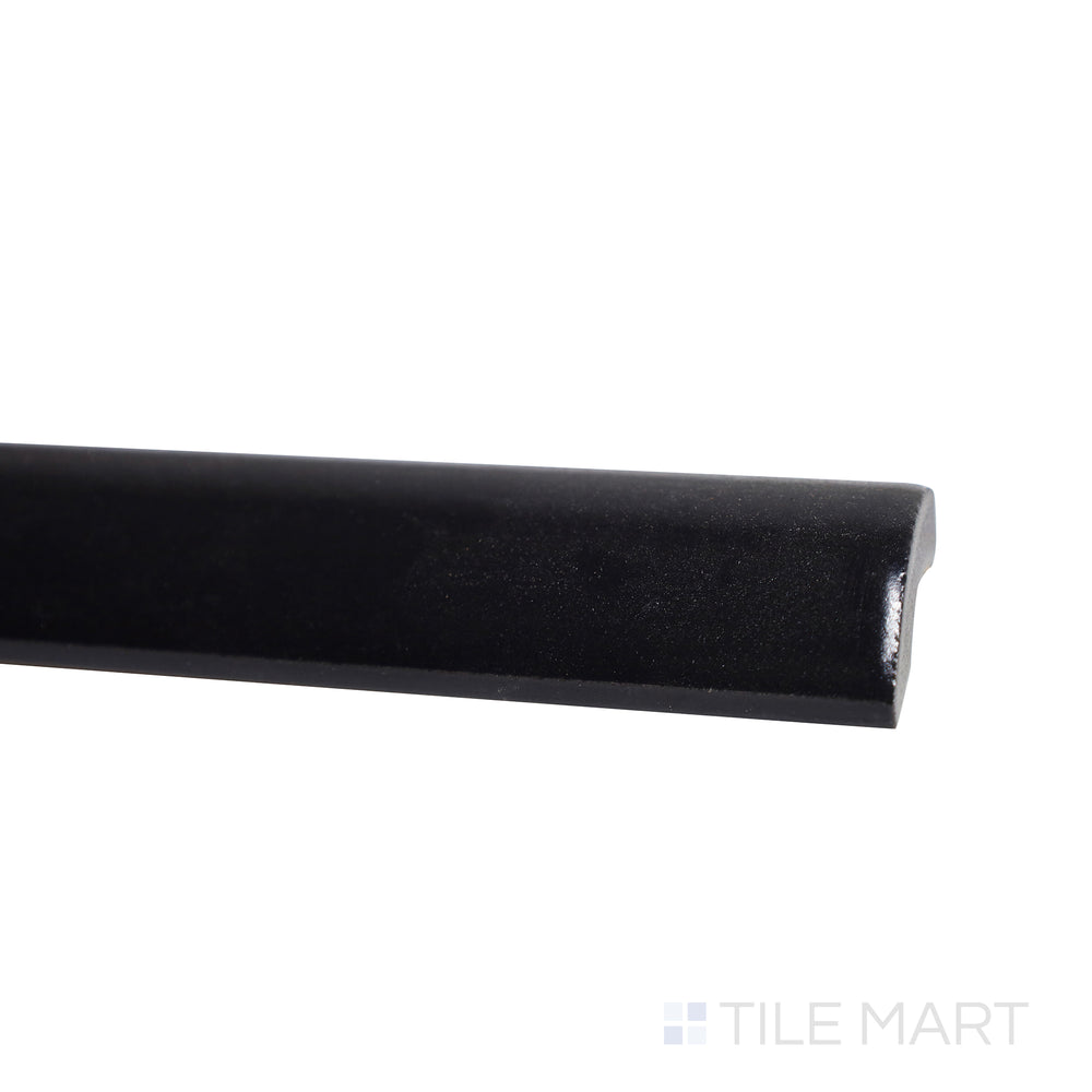 Slim profile shot highlighting the deep black shade and matte elegance of Mallorca Black 1X8 Matte Ceramic Pencil.