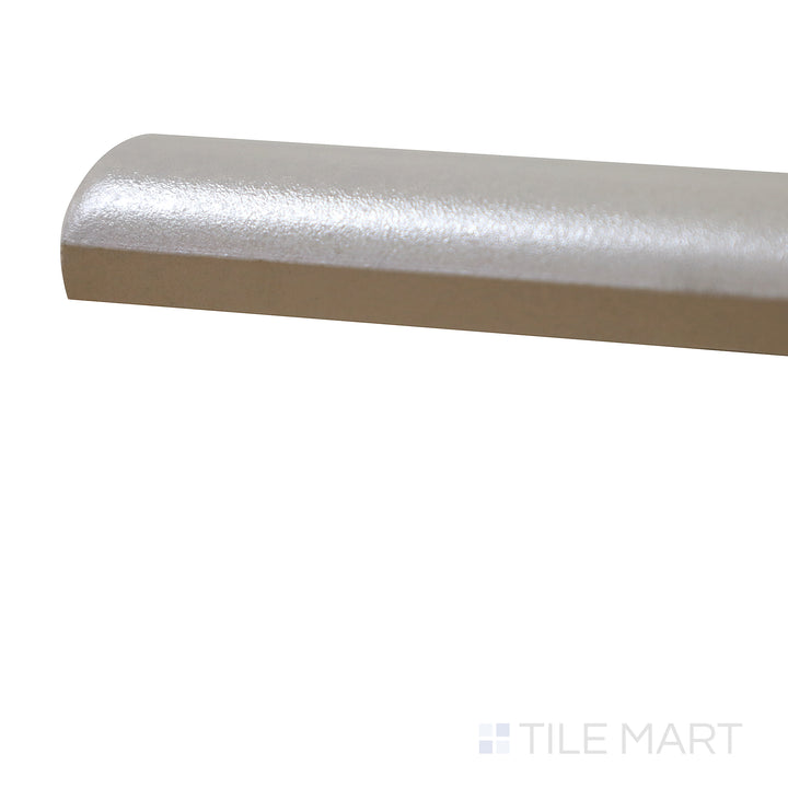 A corner perspective of the Mallorca Cream 1x8 matte ceramic pencil tile emphasizes its warm neutral tone and refined matte texture, adding a soft and elegant border detail.