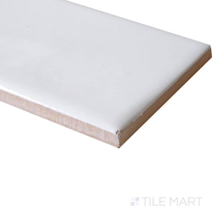 Corner view of Manhattan Ceramic 1st Ave 3x12 glossy tile showing reflective surface and edge profile