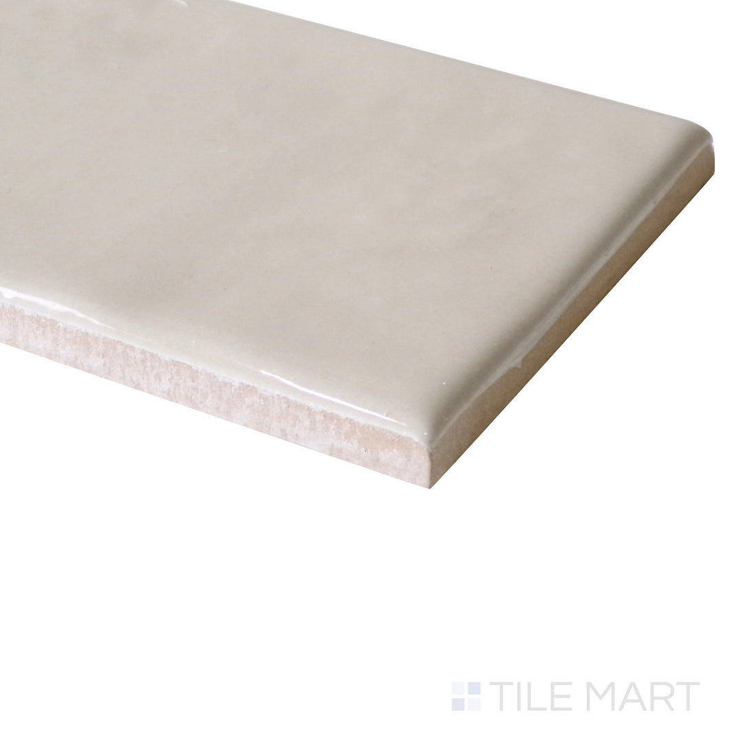 Angled view of Manhattan Ceramic 3rd Ave 3x12 glossy tile highlighting smooth finish and sharp tile edges