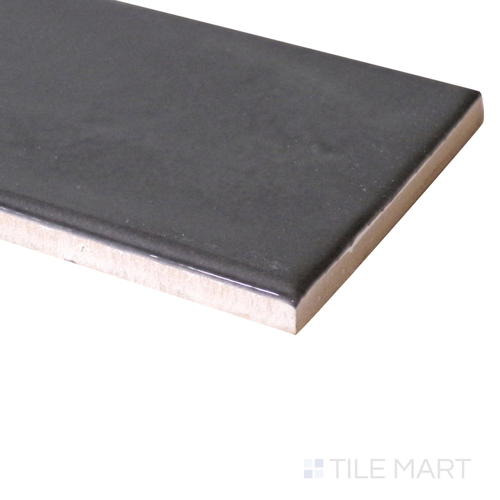 Corner view of Manhattan Ceramic 11th Ave 3x12 glossy tile focusing on sleek polished surface and refined tile edge