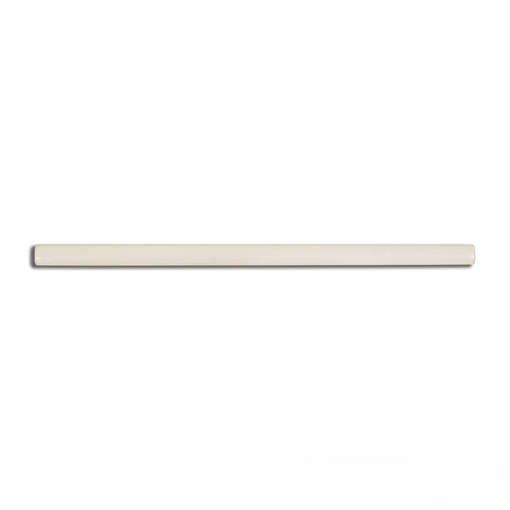 Flat lay of Manhattan Ceramic 3rd Ave 0.5x12 glossy demi-bullnose tile highlighting a sleek polished edge perfect for clean wall transitions