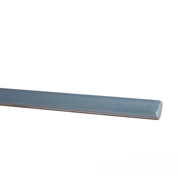 Display image of Manhattan Ceramic 7th Ave 0.5x12 glossy demi-bullnose trim featuring a shiny polished finish ideal for edges