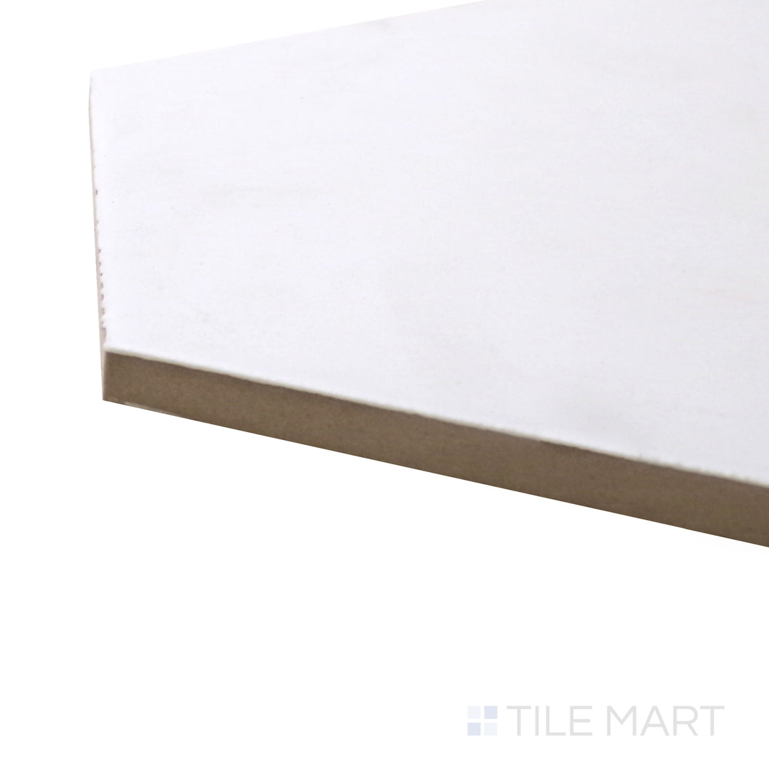 A corner perspective of the Meraki Base Blanco 8" hexagon matte porcelain tile emphasizes its crisp white shade and smooth matte finish, offering a clean and contemporary look.