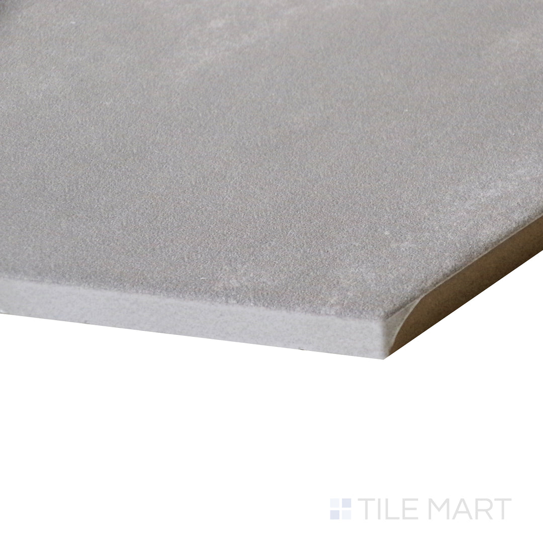 Angled close-up highlighting the crisp white surface of Meraki Base Blanco 8" hexagon matte porcelain tile.