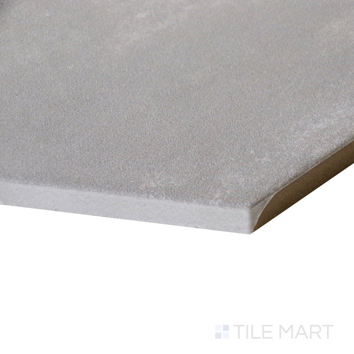 Angled close-up highlighting the crisp white surface of Meraki Base Blanco 8" hexagon matte porcelain tile.