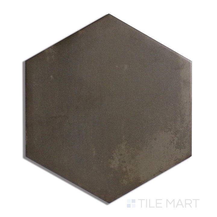 Overhead shot of Meraki Base Negro 8" Hexagon Matte Porcelain, showcasing a bold black color with a modern, understated matte finish.