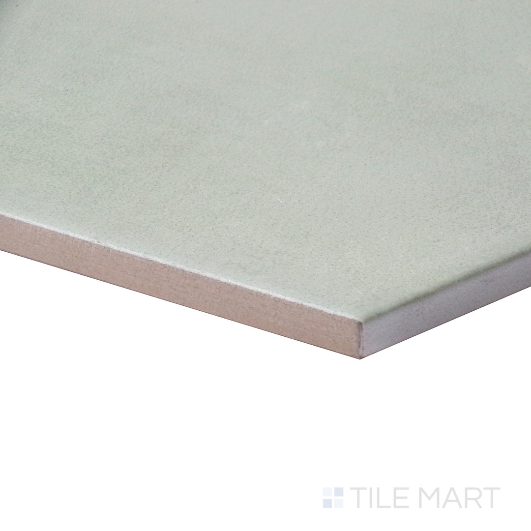 Side angle capturing the rich green elegance of Meraki Base Verde 8" hexagon matte porcelain tile.