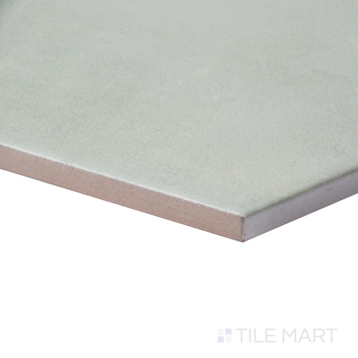Side angle capturing the rich green elegance of Meraki Base Verde 8" hexagon matte porcelain tile.