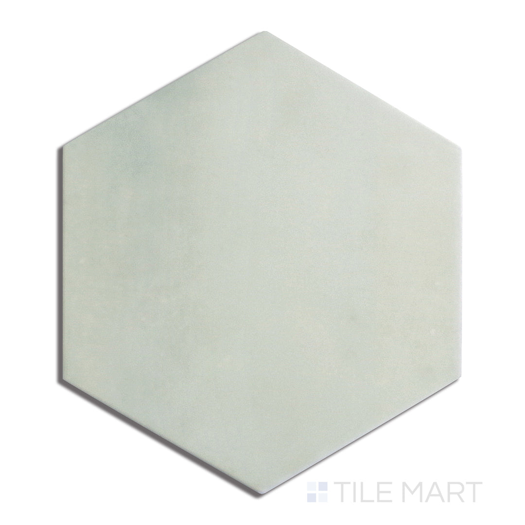 Aerial view of Meraki Base Verde 8" Hexagon Matte Porcelain, presenting an earthy green hue in a structured hexagonal matte format.