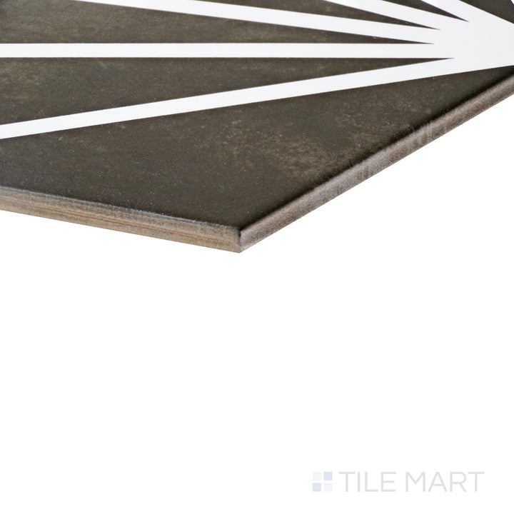 Dynamic perspective highlighting the striking black patterns of Meraki Even Deco Negro 8" hexagon matte porcelain tile.