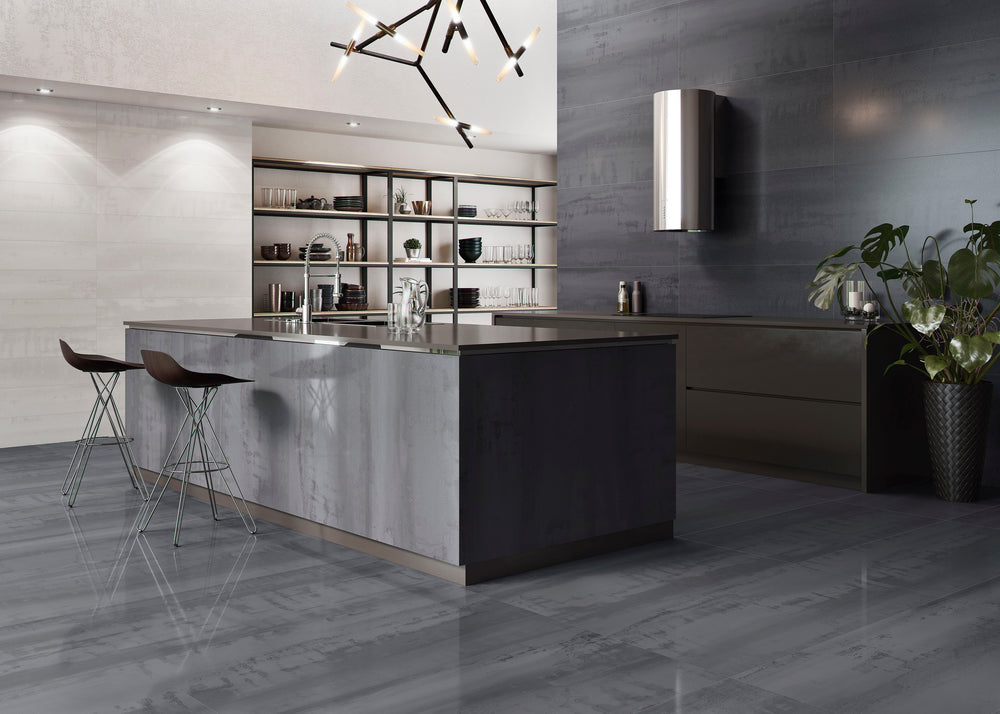 A modern and industrial-inspired space featuring Metal Lux Blue 24X48 polished porcelain, reflecting bold metallic hues for a sleek aesthetic.