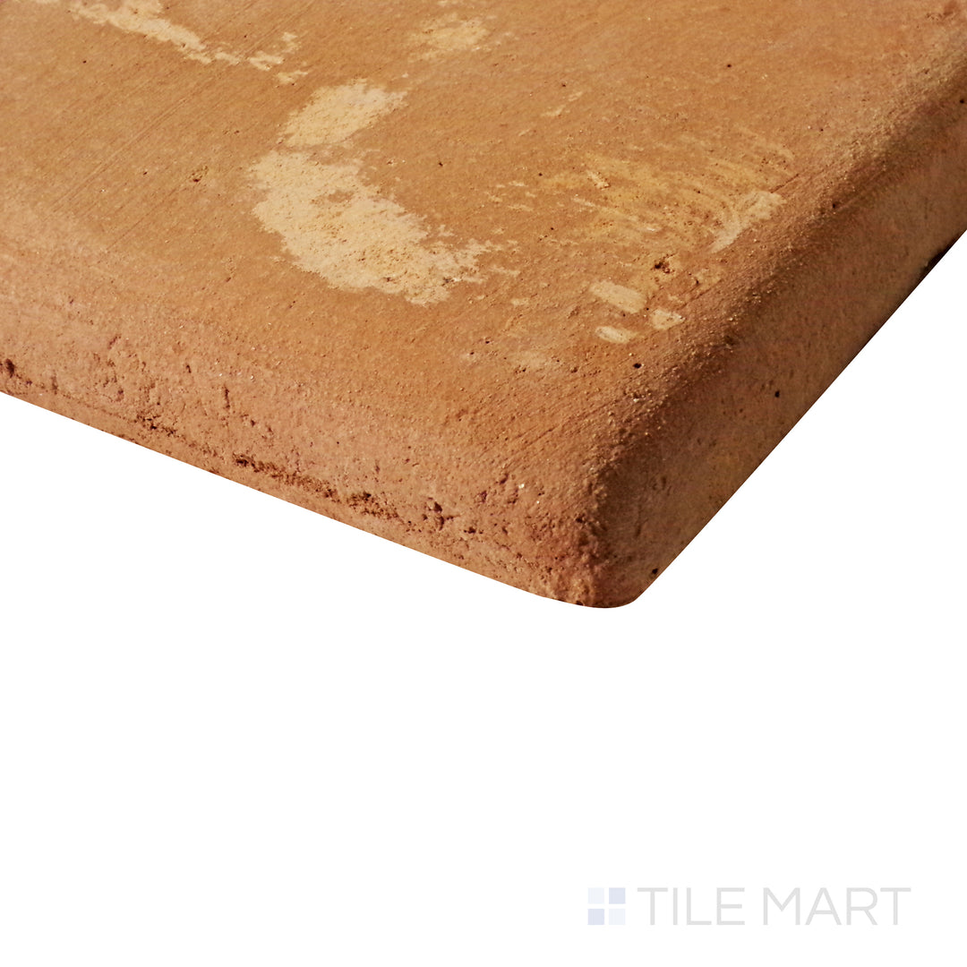 Side perspective capturing the earthy texture of Lincoln Pavers Red 12X12 natural terracotta tile.